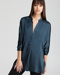 Fashioned in shimmering silk, this Vince tunic layers over your favorite skinnies for effortless chic. Fashioned in shimmering silk, this Vince tunic layers over your favorite skinnies for effortless chic.