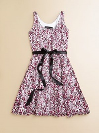 A cheery, vibrant floral print and sweet ribbon tie sash make this dress stand out from the rest.ScoopneckSleevelessPullover styleWaistband with ribbon tieFull skirt90% nylon/10% spandexHand washMade in the USA of imported fabric A cheery, vibrant floral print and sweet ribbon tie sash make this dress stand out from the rest.ScoopneckSleevelessPullover styleWaistband with ribbon tieFull skirt90% nylon/10% spandexHand washMade in the USA of imported fabric