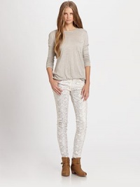 Classic five-pocket jeans updated by a wildly chic reptile print, high-shine finish and slim-leg fit. THE FITLeg opening, about 10Medium rise, about 8Inseam, about 30THE DETAILSButton closureZip flyFive-pocket style98% cotton/2% spandexDry cleanMade in USA of imported fabricModel shown is 5'9 (175cm) wearing US size 4. Classic five-pocket jeans updated by a wildly chic reptile print, high-shine finish and slim-leg fit. THE FITLeg opening, about 10Medium rise, about 8Inseam, about 30THE DETAILSButton closureZip flyFive-pocket style98% cotton/2% spandexDry cleanMade in USA of imported fabricModel shown is 5'9 (175cm) wearing US size 4.