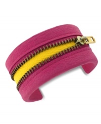Peek-a-boo! BCBGeneration's whimsical cuff bracelet features a zipper in the center that reveals a yellow accent underneath for a vibrant touch. Crafted in PVC. Approximate length: 8 inches. Peek-a-boo! BCBGeneration's whimsical cuff bracelet features a zipper in the center that reveals a yellow accent underneath for a vibrant touch. Crafted in PVC. Approximate length: 8 inches.
