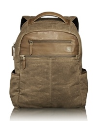 The Forge collection is rendered in wax-coated cotton canvas with leather trim accents and antiqued brass hardware for rugged appeal and utilitarian functionality. With vintage inspiration and artisan detailing, each bag is made to last and performs well in numerous environments. The large brief pack offers plenty of space with excellent organization pockets for your laptop, papers, books and files or a change of clothes for overnight trips. The Forge collection is rendered in wax-coated cotton canvas with leather trim accents and antiqued brass hardware for rugged appeal and utilitarian functionality. With vintage inspiration and artisan detailing, each bag is made to last and performs well in numerous environments. The large brief pack offers plenty of space with excellent organization pockets for your laptop, papers, books and files or a change of clothes for overnight trips.