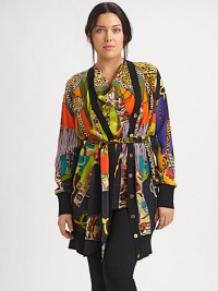 Only the finest Italian silk can give this vivid cardigan the exquisite look and feel you will love for ages.V-neckLong sleevesBanded cuffsButton frontAllover printAbout 39 from shoulder to hemSilkDry cleanMade in Italy Only the finest Italian silk can give this vivid cardigan the exquisite look and feel you will love for ages.V-neckLong sleevesBanded cuffsButton frontAllover printAbout 39 from shoulder to hemSilkDry cleanMade in Italy