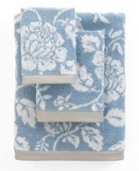 Sweet serenity. Offering a romantic and elegant composition for your bath space, this Aquarelle bath towel features pretty blooms in soft blue hues. Sweet serenity. Offering a romantic and elegant composition for your bath space, this Aquarelle bath towel features pretty blooms in soft blue hues.