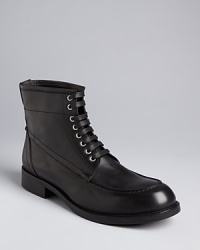 An essential black boot comes in handy whenever you need to spruce things up, in refined Italian leather for extra polish. An essential black boot comes in handy whenever you need to spruce things up, in refined Italian leather for extra polish.