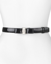 With it's slick patent leather and feminine bow detailing, Salvatore Ferragamo's leather belt lends every look polished sophistication. With it's slick patent leather and feminine bow detailing, Salvatore Ferragamo's leather belt lends every look polished sophistication.