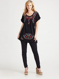 Gorgeous embroidery makes this tee stand out from the rest. Its elongated silhouette will be perfectly flattering for your figure.ScoopneckDolman sleevesAbout 33 from shoulder to hemCottonMachine washImported Gorgeous embroidery makes this tee stand out from the rest. Its elongated silhouette will be perfectly flattering for your figure.ScoopneckDolman sleevesAbout 33 from shoulder to hemCottonMachine washImported