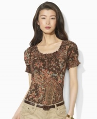 Imbued with breezy bohemian style, a soft cotton jersey top gets a romantic update in a paisley print with a smocked neckline and cuffs, from Lauren by Ralph Lauren. Imbued with breezy bohemian style, a soft cotton jersey top gets a romantic update in a paisley print with a smocked neckline and cuffs, from Lauren by Ralph Lauren.