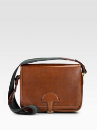 Rich saddle leather in a trim, flap bag with a sporty striped strap. Striped twill shoulder strap, 18½ drop Buckled flap closure One inside open pocket Suede lining 11½W X 8H X 4D Made in Italy Rich saddle leather in a trim, flap bag with a sporty striped strap. Striped twill shoulder strap, 18½ drop Buckled flap closure One inside open pocket Suede lining 11½W X 8H X 4D Made in Italy