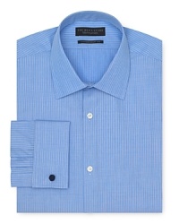Start your day off right with a refined dress shirt featuring a handsome stripe design. Start your day off right with a refined dress shirt featuring a handsome stripe design.