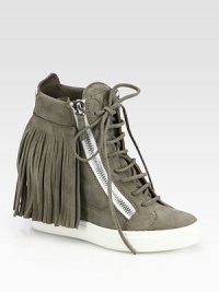 Vintage-inspired fringe adds movement to this suede sneaker with edgy zipper details, lifted by a hidden wedge and rubber platform. Hidden wedge, 3½ (90mm)Rubber platform, 1 (25mm)Compares to a 2½ heel (65mm)Suede upperSide zippers and back zipLeather liningRubber solePadded insoleMade in Italy Vintage-inspired fringe adds movement to this suede sneaker with edgy zipper details, lifted by a hidden wedge and rubber platform. Hidden wedge, 3½ (90mm)Rubber platform, 1 (25mm)Compares to a 2½ heel (65mm)Suede upperSide zippers and back zipLeather liningRubber solePadded insoleMade in Italy