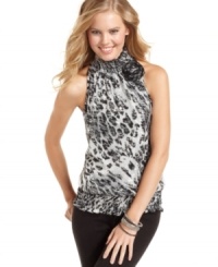 Flaunt your impeccable taste. BCX's mock-turtleneck metallic top features an awesome two-tone print and a playful rosette. Flaunt your impeccable taste. BCX's mock-turtleneck metallic top features an awesome two-tone print and a playful rosette.