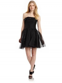 THE LOOKStrapless with interior rubber gripsInterior boningTulle bodice with sequin bow detailGathered waistTulle skirtBack zip closureTHE FITAbout 20 from top to hemTHE MATERIAL60% polyester/33% nylon/7% spandexFully linedCARE & ORIGINDry cleanImportedModel shown is 5'9 (175cm) wearing US size 4. THE LOOKStrapless with interior rubber gripsInterior boningTulle bodice with sequin bow detailGathered waistTulle skirtBack zip closureTHE FITAbout 20 from top to hemTHE MATERIAL60% polyester/33% nylon/7% spandexFully linedCARE & ORIGINDry cleanImportedModel shown is 5'9 (175cm) wearing US size 4.