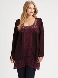 Quite possibly the prettiest tunic around, this pullover lace-detailed style offers a whimsical look and a flattering fit. Pair it with your favorite skinnies.ScoopneckLong sleevesLace detailsScalloped hemAbout 35 from shoulder to hemRayonMachine washImported Quite possibly the prettiest tunic around, this pullover lace-detailed style offers a whimsical look and a flattering fit. Pair it with your favorite skinnies.ScoopneckLong sleevesLace detailsScalloped hemAbout 35 from shoulder to hemRayonMachine washImported