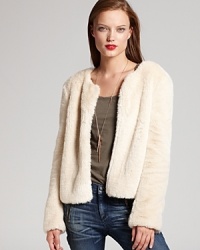 Modern elegance meets exotic attitude as plush faux-fur outfits a chic DKNYC jacket. Style with leather leggings for a refined walk on the wild side. Modern elegance meets exotic attitude as plush faux-fur outfits a chic DKNYC jacket. Style with leather leggings for a refined walk on the wild side.