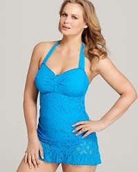 Diamond-patterned crochet adds textural appeal to this Becca Etc. tankini, rendered in a flattering halter silhouette with a skirted bottom for extra coverage. Diamond-patterned crochet adds textural appeal to this Becca Etc. tankini, rendered in a flattering halter silhouette with a skirted bottom for extra coverage.