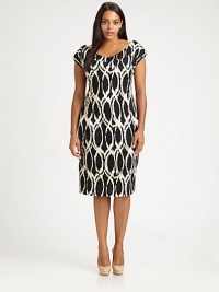 A perfectly printed and perfectly fitting cap-sleeve dress. Its feminine neckline will flawlessly complement your decolletage and shoulders.ScoopneckCap sleevesAllover printPull-on styleAbout 24 from natural waistRayon/polyester/spandexDry cleanMade in USA of imported fabric A perfectly printed and perfectly fitting cap-sleeve dress. Its feminine neckline will flawlessly complement your decolletage and shoulders.ScoopneckCap sleevesAllover printPull-on styleAbout 24 from natural waistRayon/polyester/spandexDry cleanMade in USA of imported fabric