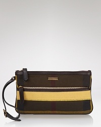Perfect the day-to-night downsize with this checked accessory from Burberry. It boasts the brand's classic print, yet in a wrist-friendly shape that's wholly modern. Perfect the day-to-night downsize with this checked accessory from Burberry. It boasts the brand's classic print, yet in a wrist-friendly shape that's wholly modern.