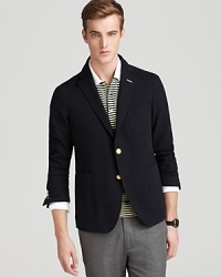 Classic in cotton, GANT Rugger's slim fit navy blazer lends a polished look with gold-tone buttons. Classic in cotton, GANT Rugger's slim fit navy blazer lends a polished look with gold-tone buttons.