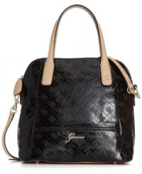 A pretty patent look that brings the shine. This dome satchel from GUESS is the perfect office to after hours design, featuring a sleek embossed exterior and polished gold-tone accents. A pretty patent look that brings the shine. This dome satchel from GUESS is the perfect office to after hours design, featuring a sleek embossed exterior and polished gold-tone accents.