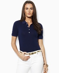 Designed for a trim, body-skimming fit in soft finely ribbed cotton, the iconic polo shirt receives a chic update with gleaming silver-tone metal buttons. Designed for a trim, body-skimming fit in soft finely ribbed cotton, the iconic polo shirt receives a chic update with gleaming silver-tone metal buttons.