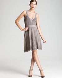A strappy silhouette and nude palette lend provocative edge to a Z Spoke Zac Posen dress. Slip a sweater over the style for office chic, or dawn the it solo for a stunning evening ensemble. A strappy silhouette and nude palette lend provocative edge to a Z Spoke Zac Posen dress. Slip a sweater over the style for office chic, or dawn the it solo for a stunning evening ensemble.