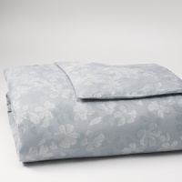 Softly rendered laurel blossoms gracefully adorn a soothing flint background. Set includes a duvet cover and two shams. Coordinates beautifully with Calvin Klein Home Breeze Sheet Set. Softly rendered laurel blossoms gracefully adorn a soothing flint background. Set includes a duvet cover and two shams. Coordinates beautifully with Calvin Klein Home Breeze Sheet Set.