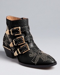 With a distinct point-of-view on the Western trend, these Chloé booties make their mark among the crowd. Dance to a fresh beat. With a distinct point-of-view on the Western trend, these Chloé booties make their mark among the crowd. Dance to a fresh beat.