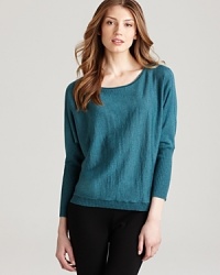 A vibrant hue emboldens a boxy Eileen Fisher top for effortless everyday style. Showcase the dolman silhouette against sleek, black denim. A vibrant hue emboldens a boxy Eileen Fisher top for effortless everyday style. Showcase the dolman silhouette against sleek, black denim.