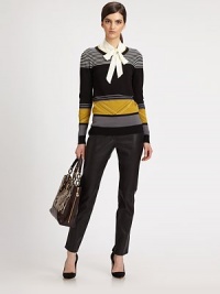 Graphic-charged stripes give this lightweight knit the right touch of eye-catching detail that's become a staple of any Milly design.CrewneckLong sleevesRibbed trimPullover styleAbout 24 from shoulder to hem72% viscose/28% polyesterDry cleanImportedModel shown is 5'9½ (176cm) wearing US size Small.