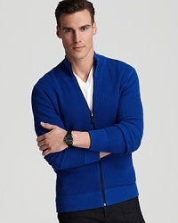 A handsome zip-front sweater, crafted in soft cotton, demonstrates its utility all week, pairing effortlessly with jeans and chinos for a sporty but refined style. A handsome zip-front sweater, crafted in soft cotton, demonstrates its utility all week, pairing effortlessly with jeans and chinos for a sporty but refined style.