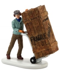 A deliveryman drops off a very tall order for Ralphie's old man in this true-to-life figurine from A Christmas Story Village by Department 56. A deliveryman drops off a very tall order for Ralphie's old man in this true-to-life figurine from A Christmas Story Village by Department 56.