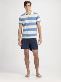 A summer wardrobe essential, shaped with an easy fit and brightly colored side panels.Drawstring elastic tie waistBack welt pocketInseam, about 3PolyesterMachine washImported A summer wardrobe essential, shaped with an easy fit and brightly colored side panels.Drawstring elastic tie waistBack welt pocketInseam, about 3PolyesterMachine washImported