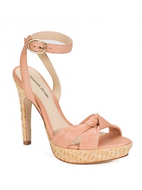 Rustic straw heel and platform underneath a supple leather look with a knot detail and crisscross ankle strap.Straw-covered heel 4½ (115mm) Straw-covered platform, ½ (15mm) Compares to a 4 heel (100mm) Open toe Top knot detail Crisscross ankle strap Leather lining and sole Padded insole Imported Rustic straw heel and platform underneath a supple leather look with a knot detail and crisscross ankle strap.Straw-covered heel 4½ (115mm) Straw-covered platform, ½ (15mm) Compares to a 4 heel (100mm) Open toe Top knot detail Crisscross ankle strap Leather lining and sole Padded insole Imported