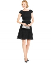 Anne Klein's belted lace dress is a classic look and versatile style that you can wear for seasons to come. Anne Klein's belted lace dress is a classic look and versatile style that you can wear for seasons to come.