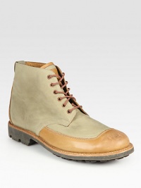 Expert craftsmanship is highlighted in this rugged, yet refined, lace-up boot constructed in a textural blend of canvas and genuine leather.Canvas/leather upperLeather liningRubber soleImported Expert craftsmanship is highlighted in this rugged, yet refined, lace-up boot constructed in a textural blend of canvas and genuine leather.Canvas/leather upperLeather liningRubber soleImported