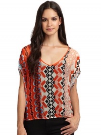 THE LOOKAllover tribal-inspired printElastic waistBack cutout detailTHE FITAbout 21 from shoulder to hemTHE MATERIALRayonCARE & ORIGINDry cleanMade in USAModel shown is 5'11 (180cm) wearing US size Small. THE LOOKAllover tribal-inspired printElastic waistBack cutout detailTHE FITAbout 21 from shoulder to hemTHE MATERIALRayonCARE & ORIGINDry cleanMade in USAModel shown is 5'11 (180cm) wearing US size Small.