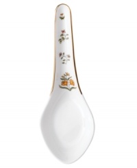 The exotic India dinnerware pattern presents a pattern of exquisitely detailed florals on a yellow and deep blue band against pure white bone china. The exotic India dinnerware pattern presents a pattern of exquisitely detailed florals on a yellow and deep blue band against pure white bone china.