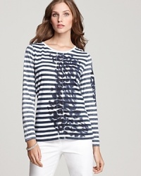 An modernist floral print seems like it's been hand-painted at the front of this BASLER striped tee, putting an artful spin on a style classic. An modernist floral print seems like it's been hand-painted at the front of this BASLER striped tee, putting an artful spin on a style classic.