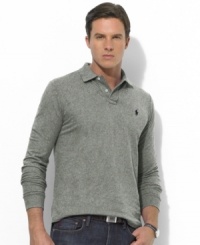 A long-sleeved polo shirt embroidered with Ralph Lauren's iconic pony is cut in a relaxed, comfortable fit from breathable cotton mesh for classic style. A long-sleeved polo shirt embroidered with Ralph Lauren's iconic pony is cut in a relaxed, comfortable fit from breathable cotton mesh for classic style.