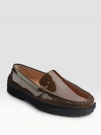 Shiny patent leather design is part loafer, part driver, pure comfort on a nubby rubber sole. Rubber heel, ½ (15mm) Moccasin-stitched front Rubber nub detail at heel Leather lining Rubber sole Made in ItalyOUR FIT MODEL RECOMMENDS ordering true size.. Shiny patent leather design is part loafer, part driver, pure comfort on a nubby rubber sole. Rubber heel, ½ (15mm) Moccasin-stitched front Rubber nub detail at heel Leather lining Rubber sole Made in ItalyOUR FIT MODEL RECOMMENDS ordering true size..