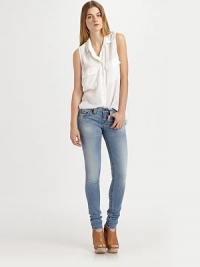 Light, sand-blasted denim in an ultra-skinny fit that hugs every curve.THE FITSkinny fitMedium rise, about 8Inseam, about 33THE DETAILSZip flyFive-pocket styleSignature stitch back patch pockets98% cotton/2% spandexMachine washMade in USAModel shown is 5'9½ (176cm) wearing US size 4. Light, sand-blasted denim in an ultra-skinny fit that hugs every curve.THE FITSkinny fitMedium rise, about 8Inseam, about 33THE DETAILSZip flyFive-pocket styleSignature stitch back patch pockets98% cotton/2% spandexMachine washMade in USAModel shown is 5'9½ (176cm) wearing US size 4.