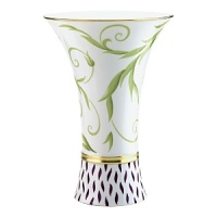 Frivole combines daring originality with soft feminity to create a sophisticated design for the table. Sprawling leaf-work designs add exuberant elegance to this whimsical pattern. Coordinating colors of amethyst and sage with gold trim allow versatility when entertaining formally or casually. Frivole combines daring originality with soft feminity to create a sophisticated design for the table. Sprawling leaf-work designs add exuberant elegance to this whimsical pattern. Coordinating colors of amethyst and sage with gold trim allow versatility when entertaining formally or casually.