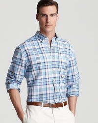 This classic fit Vineyard Vines cotton button-up lends a preppy look in pale-hued plaid. This classic fit Vineyard Vines cotton button-up lends a preppy look in pale-hued plaid.