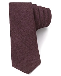 A melange of materials creates subtle tonal shifts on this tie from Theory, skinny in width for your modern attire. A melange of materials creates subtle tonal shifts on this tie from Theory, skinny in width for your modern attire.