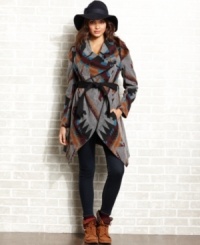 Layer-up this season in a blanket coat from American Rag that's tribal-du-jour. Features a statement-making navajo-print and an organic design of folds and divides. Layer-up this season in a blanket coat from American Rag that's tribal-du-jour. Features a statement-making navajo-print and an organic design of folds and divides.