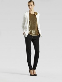 Black crepe romain jogging pants with natural white light cady and bronze leather coulisse detail.Drawstring waistSlim legBronze leather details95% silk/5% elastaneDry cleanMade in Italy of imported fabric Black crepe romain jogging pants with natural white light cady and bronze leather coulisse detail.Drawstring waistSlim legBronze leather details95% silk/5% elastaneDry cleanMade in Italy of imported fabric