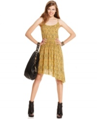 A sloping hem plus a tribal-icious print makes this day dress from Material Girl a chic pick for hot days! A sloping hem plus a tribal-icious print makes this day dress from Material Girl a chic pick for hot days!