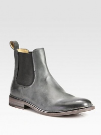 A classic chelsea boot is a sartorial standard, crafted here in burnished leather for a well-worn finish and with side elastic gores for a superior fit.Leather upperLeather liningPadded insoleLeather soleImportedThis style runs true to size. We recommend ordering your usual size for a standard fit. A classic chelsea boot is a sartorial standard, crafted here in burnished leather for a well-worn finish and with side elastic gores for a superior fit.Leather upperLeather liningPadded insoleLeather soleImportedThis style runs true to size. We recommend ordering your usual size for a standard fit.