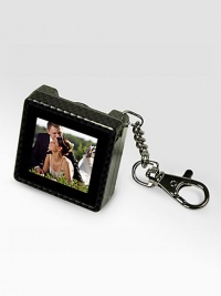 Carry your favorite photos in your pocket so you can share and relive your most precious moments anytime, anywhere. Simply use the included software to convert images from your computer to the album, then crop, resize and scroll through up to 124 photos manually or in a slideshow. Carry your favorite photos in your pocket so you can share and relive your most precious moments anytime, anywhere. Simply use the included software to convert images from your computer to the album, then crop, resize and scroll through up to 124 photos manually or in a slideshow.
