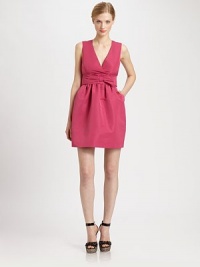 Beyond pretty, this sleeveless sheath features a feminine bow detail, convenient slash pockets and a flattering full skirt.V-neckSleevelessBow detail at Empire waistSlash pocketsAbout 22 from natural waistPolyesterDry cleanMade in Italy of imported fabric Beyond pretty, this sleeveless sheath features a feminine bow detail, convenient slash pockets and a flattering full skirt.V-neckSleevelessBow detail at Empire waistSlash pocketsAbout 22 from natural waistPolyesterDry cleanMade in Italy of imported fabric